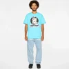 Camiseta con insignia rosa
