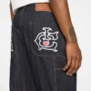 Pantalones de carpintero de denim Running Dog con ribete
