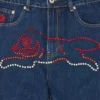 Pantalones vaqueros con Running Dog de cristal